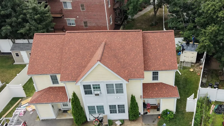 Same roof in Lowell, MA after the replacement, with a new shingle system installed