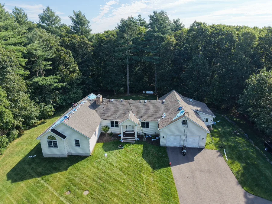 Aerial view of a shingle roof on a single-story home