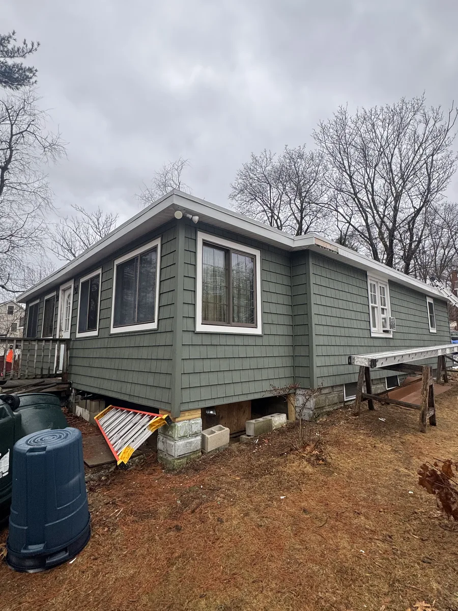Finished exterior siding installation on a home in Lowell, MA