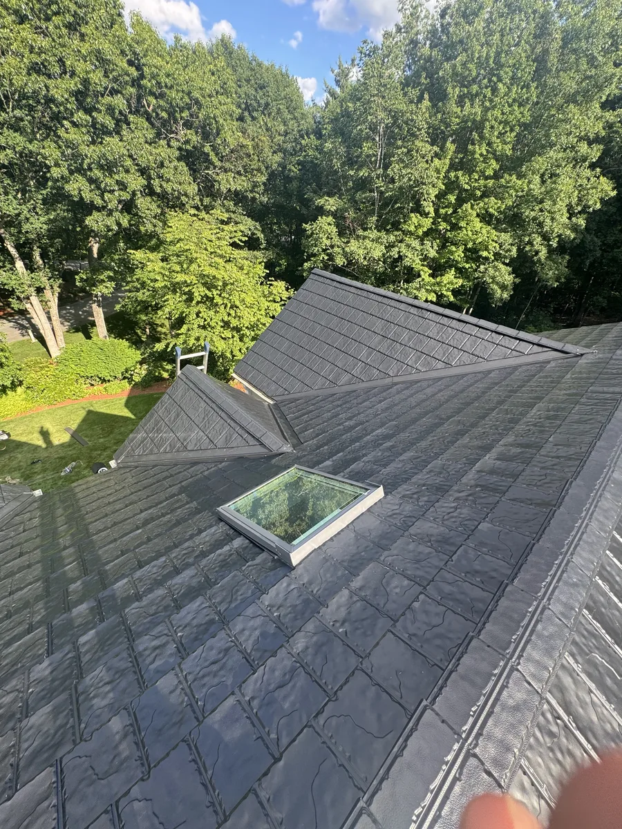 Skylight installed on a slate-style synthetic roof in Lowell, MA