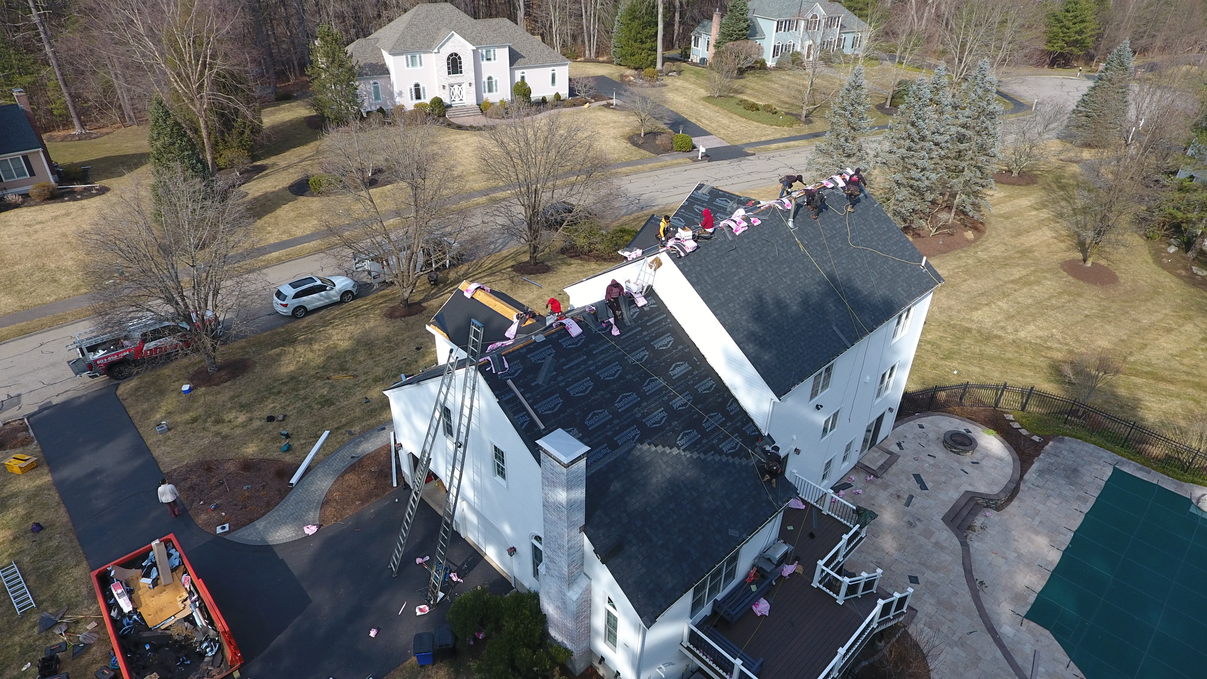 Â Professional crew replacing rotted roof rafters on older home in New Hampshire