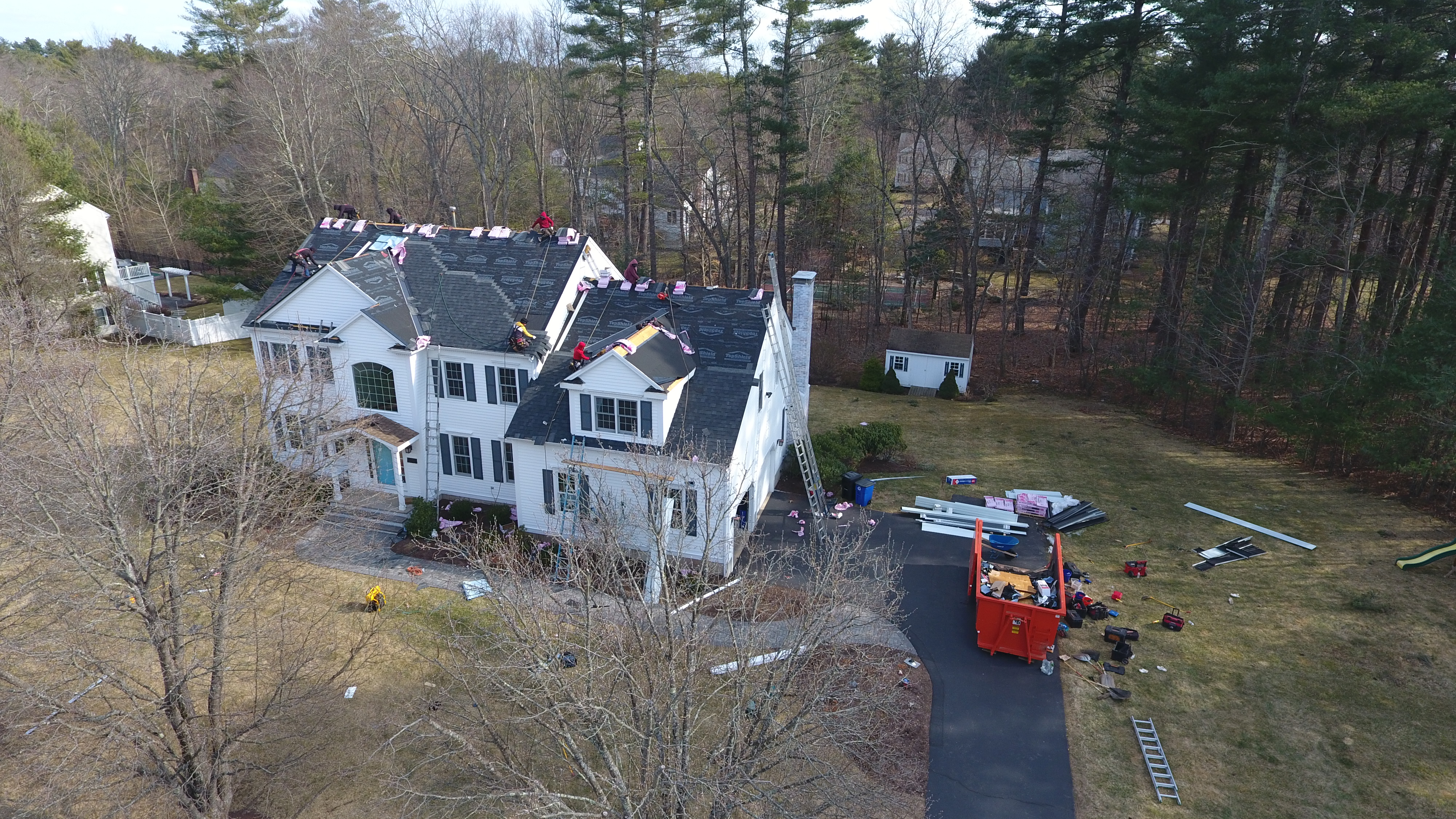 Experienced residential roofers installing drip edge and starter strips in Lowell MA
