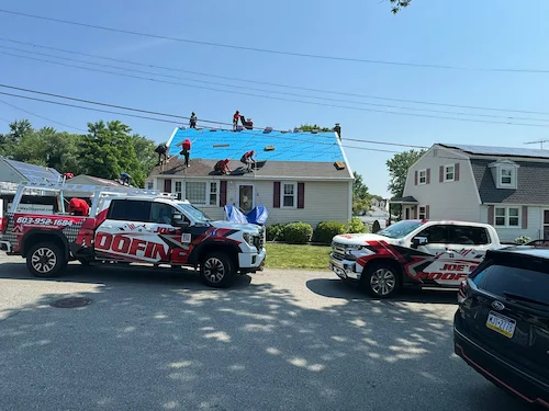 Roof repair work fixing loose flashing around vent penetration to prevent future leaks