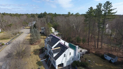 Before and after photos of skylight installation showing improved natural lighting in home