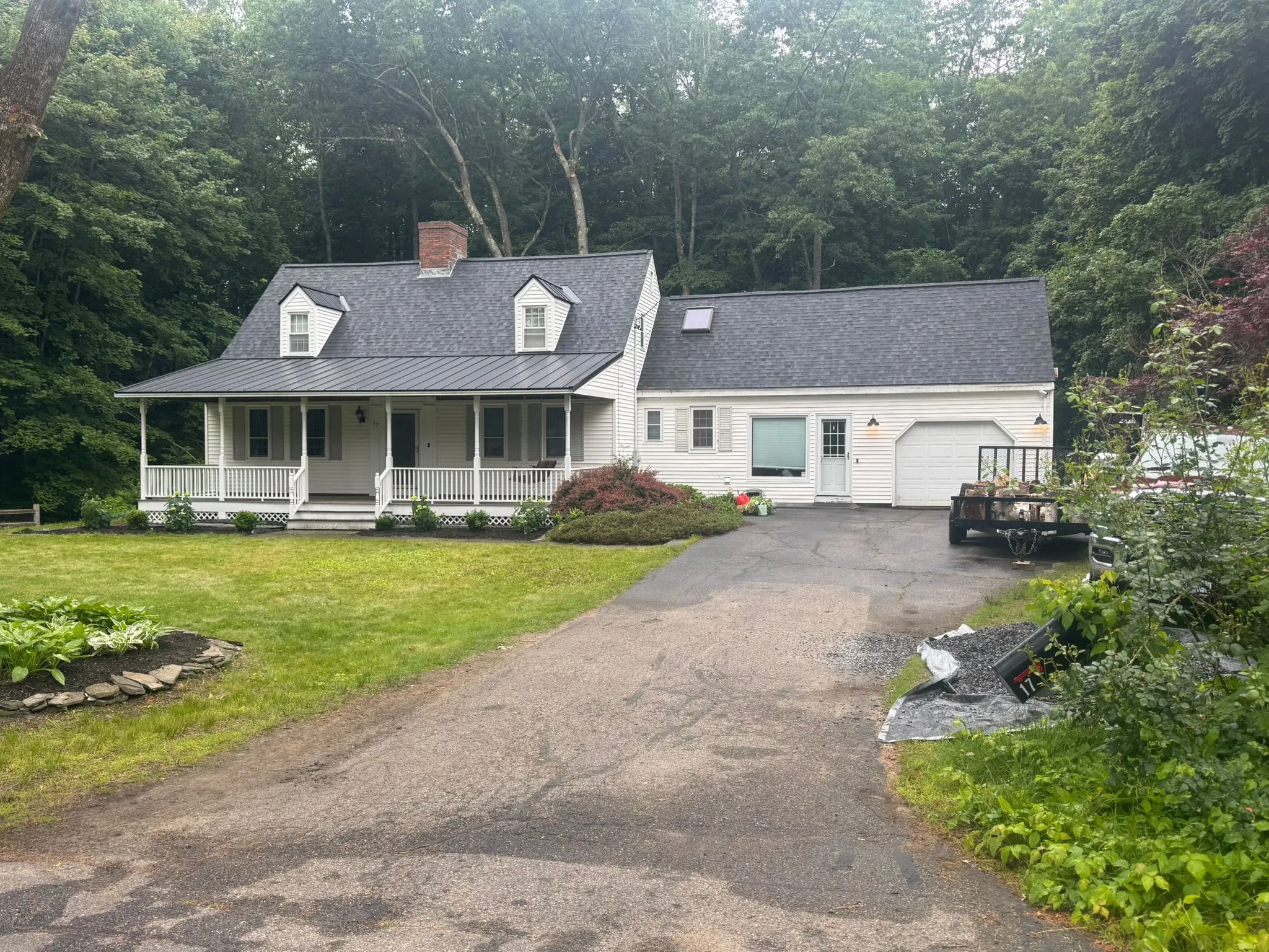 Skilled roofers performing hail damage assessment and insurance documentation in NH